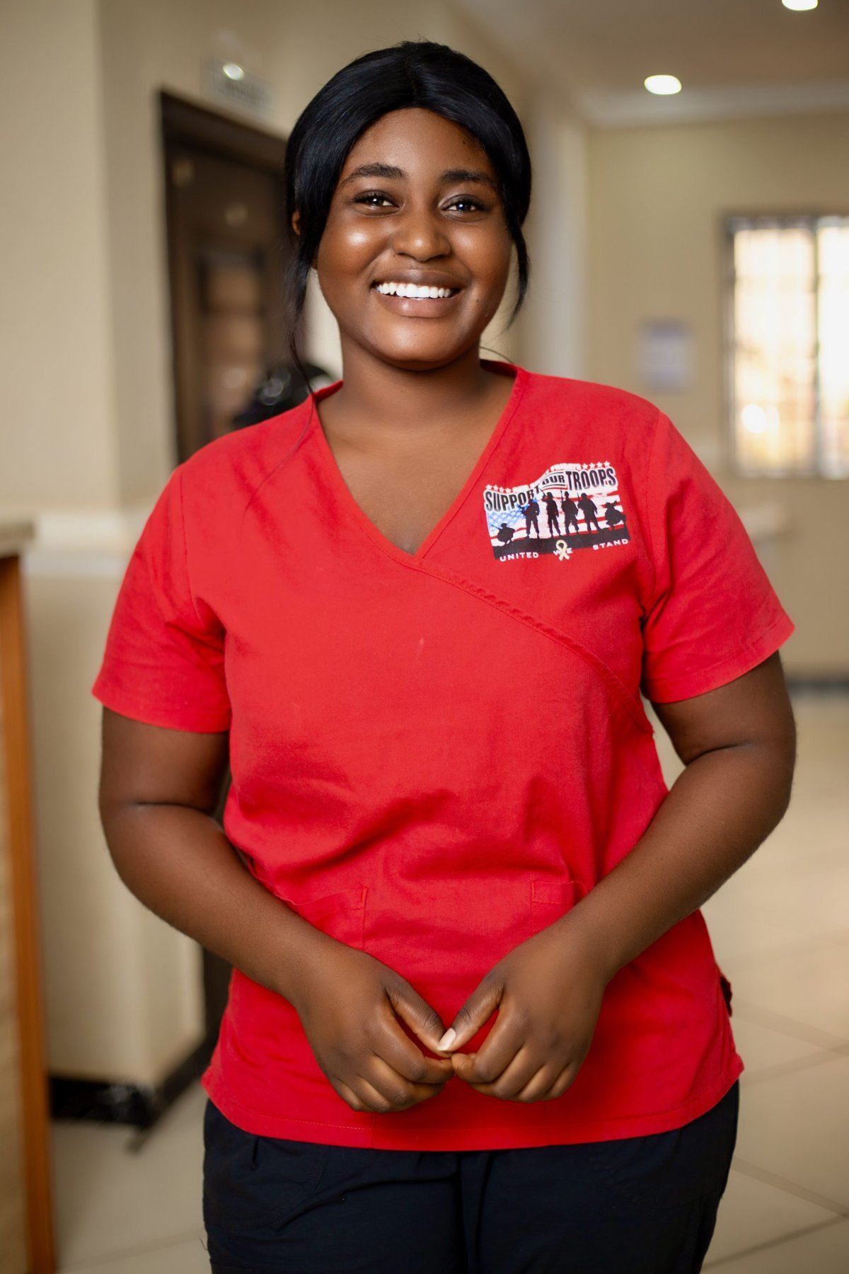 Akoma healthcare professional smiling